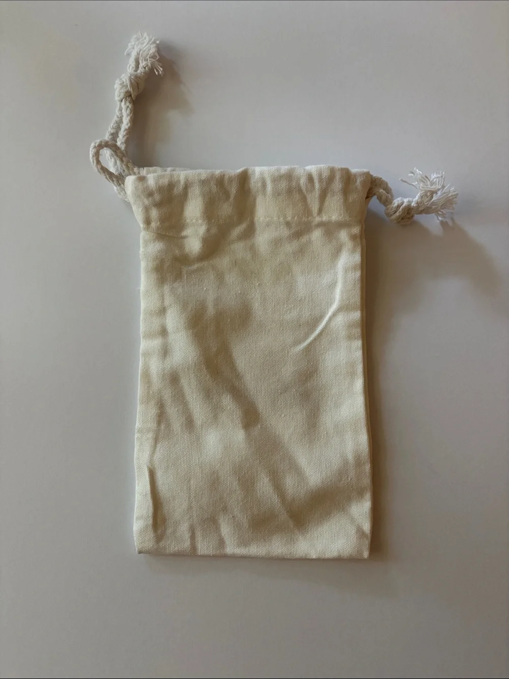 NWOT Dr. Barbara Sturm Cream Canvas Drawstring Bag with Black Logo